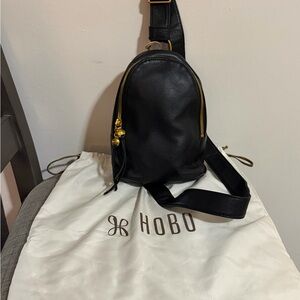 HOBO Black Leather Sling Bag with Gold Accents